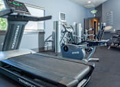 Thumbnail 21 of 33 - Cardio Machines In Gym at Four Seasons at Southtowne Apartments, South Jordan, UT