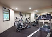 Thumbnail 27 of 30 - Fitness Center Equipment at Metropolitan Place Apartments, Washington, 98057