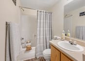 Thumbnail 6 of 20 - Glen Oaks Bright Bathroom