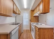 Thumbnail 3 of 20 - Glen Oaks Kitchen with White Appliances