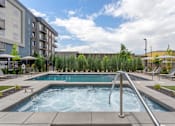 Thumbnail 16 of 42 - Hot Tub and Pool at City Lofts Apartments