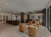 Thumbnail 25 of 85 - A spacious living room with a large sofa set and a coffee table.