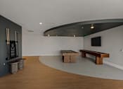 Thumbnail 33 of 85 - A room with a black wall and a wooden bench.