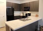 Thumbnail 6 of 46 - Kitchen at Arcadia Apartments