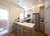 Thumbnail 5 of 27 - Fully Equipped Kitchen at Desert Sage Townhomes