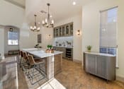 Thumbnail 23 of 44 - Kitchen with Granite Countertops in Clubhouse at Echo Ridge
