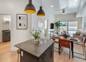 Thumbnail 3 of 34 - Kitchen into Living Room at Maye House Apartments