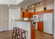 Thumbnail 4 of 20 - Kitchen with Island at Canyon Ridge
