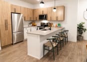 Thumbnail 3 of 61 - Kitchen with a Surplus of Storage at Parc on 5th II American Fork, UT
