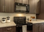 Thumbnail 13 of 38 - Modern Kitchen at Garden Lofts Apartments, Utah