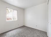 Thumbnail 12 of 22 - Large Bedroom at Rio Seco Apartments