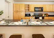 Thumbnail 8 of 33 - Large Open Kitchen at Four Seasons at Southtowne Apartments, South Jordan, UT