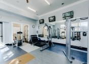 Thumbnail 46 of 61 - Lifting Equipment  in Gym at Parc at Day Dairy Apartments and Townhomes, Utah, 84020