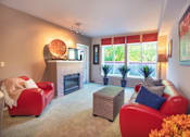 Thumbnail 9 of 30 - Living Room with Fireplace at Metropolitan Place Apartments, Renton, WA, 98057