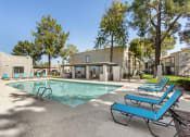 Thumbnail 18 of 29 - our apartments have a resort style swimming pool with blue benches