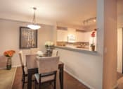 Thumbnail 11 of 30 - Dining Room and Kitchen View at Metropolitan Place Apartments, Renton, Washington