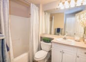Thumbnail 10 of 40 - Updated bathroom with tub/shower combination at Metropolitan Collection Apartments, Washington, 98057