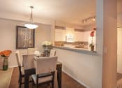 Thumbnail 12 of 40 - Dining Area And Open Kitchen at Metropolitan Collection Apartments, Renton, Washington
