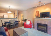 Thumbnail 15 of 40 - Open Living  With Fireplace at Metropolitan Collection Apartments, Washington