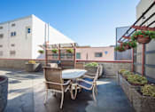 Thumbnail 28 of 30 - Rooftop Terrace Seating at Metropolitan Place Apartments, Renton