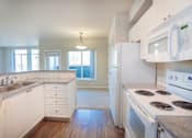 Thumbnail 13 of 30 - Fully Equipped Kitchen at Metropolitan Place Apartments, Washington