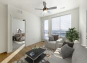 Thumbnail 5 of 14 - One Bedroom Living Room with View of Bedroom at City Lofts
