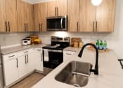 Thumbnail 5 of 61 - Open Concept Kitchen at Parc on 5th II American Fork, UT