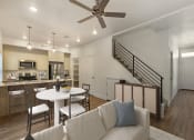 Thumbnail 4 of 27 - Open Concept Living Room into Kitchen at Desert Sage Hurricane, UT 84737