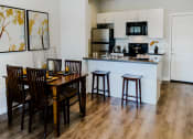 Thumbnail 23 of 61 - Open Concept Kitchen with Light Cabinetry at Parc at Day Dairy Apartments and Townhomes, Draper, 84020