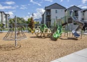 Thumbnail 22 of 25 - Outdoor Playground at Meadows at Homestead Logan, UT 84321