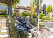 Thumbnail 28 of 28 - Outdoor waterfall at Eucalyptus Grove Apartments California