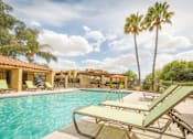 Thumbnail 10 of 18 - Pool With Sundeck at River Point Apartments, Arizona