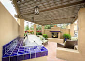 Thumbnail 12 of 18 - Outdoor Fireplace at River Point Apartments, Tucson, AZ