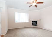 Thumbnail 13 of 44 - Living Room With Standard Fireplace at Echo Ridge Apartments, Castle Rock, 80108