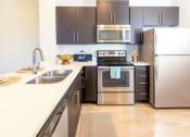 Thumbnail 3 of 38 - Energy Efficient All Electric Kitchen at Parc on Center Apartments & Townhomes, Orem