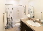 Thumbnail 10 of 38 - Spa-like Bathroom with Tub and Shower at Parc on Center Apartments & Townhomes, Utah
