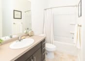 Thumbnail 14 of 38 - Spacious Bathroom With Storage at Parc on Center Apartments & Townhomes, Utah, 84057