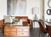 Thumbnail 8 of 39 - Sofa and A Lamp in Living Space at Rivulet Apartments, American Fork