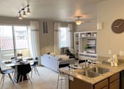 Thumbnail 4 of 38 - Living Room With Kitchen View at San Marino Apartments, South Jordan, UT, 84095