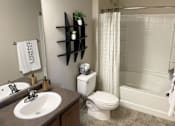 Thumbnail 18 of 38 - Luxurious Bathroom with Tub & Shower  at San Marino Apartments, South Jordan, Utah