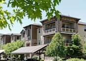 Thumbnail 21 of 38 - Exquisite Exterior with Covered Parking at San Marino Apartments, South Jordan, 84095