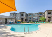 Thumbnail 27 of 39 - Swimming Pool And Relaxing Area at San Tropez Apartments & Townhomes, Utah, 84095