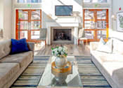 Thumbnail 34 of 39 - Resident Clubhouse with Fireplace Sitting Area at San Tropez Apartments & Townhomes, South Jordan, Utah