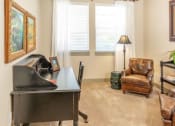 Thumbnail 12 of 39 - Spacious Home Office with Desk and Chair at San Tropez Apartments & Townhomes, Utah, 84095