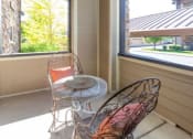 Thumbnail 17 of 39 - Balcony Seating area at San Tropez Apartments & Townhomes, South Jordan, UT