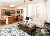 Thumbnail 14 of 39 - Living Room with Kitchen View at San Tropez Apartments & Townhomes, Utah