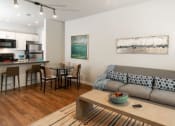 Thumbnail 15 of 39 - Woodgrain Floor Living Room at San Tropez Apartments & Townhomes, Utah, 84095