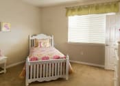 Thumbnail 11 of 38 - Secondary Bedroom With Expansive Windows at Talavera at the Junction Apartments & Townhomes, Midvale, 84047