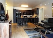 Thumbnail 13 of 36 - Living Room With Open Kitchen and Dining at Enclave at 1400 South Apartments, Salt Lake City, Utah