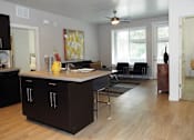 Thumbnail 15 of 36 - Island Kitchen and Open Living at Enclave at 1400 South Apartments, Utah